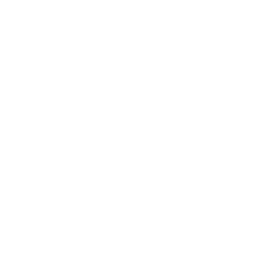 White outline icon of a camper van or RV, shown from the side with two wheels, windows, and a door, on a transparent background.