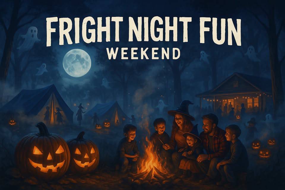 A family sits around a campfire at night with carved pumpkins, tents, and a house in the background, surrounded by ghost decorations. Text reads "Fright Night Fun Weekend.